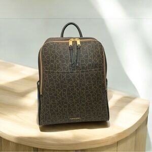 Calvin Klein Embossed Monogram Backpack - Rtail $188